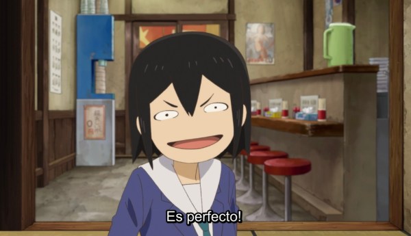 A girl in a school uniform smiles and says "Es perfecto."